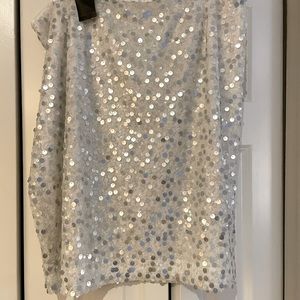 Skirt A-line, sequined and beaded.